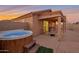 Inviting hot tub on a patio with seating area at 23699 N Oasis Blvd, Florence, AZ 85132