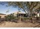 View of backyard oasis with desert landscaping at 26175 W Firehawk Dr, Buckeye, AZ 85396