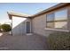 Backyard view showing access door and landscaping at 26175 W Firehawk Dr, Buckeye, AZ 85396