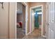 Guest bathroom with teal shower curtain and wood vanity at 26175 W Firehawk Dr, Buckeye, AZ 85396