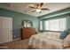 Comfortable bedroom with dresser and window seating at 26175 W Firehawk Dr, Buckeye, AZ 85396