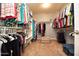 Walk-in closet with ample shelving and hanging space at 26175 W Firehawk Dr, Buckeye, AZ 85396