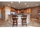 Spacious kitchen with granite countertops and stainless steel appliances at 26175 W Firehawk Dr, Buckeye, AZ 85396