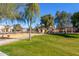 playground with play structures and shaded areas at 2626 E Bear Creek Ln, Phoenix, AZ 85024