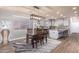 Bright dining area with hardwood floors and a modern chandelier at 2626 E Bear Creek Ln, Phoenix, AZ 85024