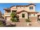 Two-story house with stone accents and landscaping at 2626 E Bear Creek Ln, Phoenix, AZ 85024