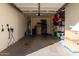 Two-car garage with extra storage space and EV charger at 2626 E Bear Creek Ln, Phoenix, AZ 85024