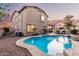 Stunning backyard with a refreshing pool, a basketball hoop, and outdoor seating at 2626 E Bear Creek Ln, Phoenix, AZ 85024