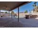 Backyard patio featuring a built-in grill and desert landscaping at 2848 E Menlo St, Mesa, AZ 85213