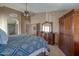 Bedroom featuring wardrobe, shuttered window and vintage furniture at 2848 E Menlo St, Mesa, AZ 85213