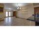 Open dining area with french doors to the backyard and custom shelving at 2848 E Menlo St, Mesa, AZ 85213