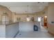 Neutral hallway featuring high ceilings, carpet and decorative artwork at 2848 E Menlo St, Mesa, AZ 85213