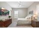 Bright bedroom with a comfy bed and plenty of light at 3015 E Daley Ln, Phoenix, AZ 85050