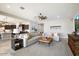 Bright and airy living room with sectional sofa at 3015 E Daley Ln, Phoenix, AZ 85050