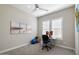 Home office with desk, chair, and natural light at 3015 E Daley Ln, Phoenix, AZ 85050