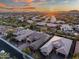 Aerial view of a luxury home community at sunset at 30224 N 52Nd Pl, Cave Creek, AZ 85331