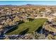 Large community park with a central grassy area and walking paths at 30224 N 52Nd Pl, Cave Creek, AZ 85331