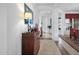 Elegant hallway with hardwood floors, curved wooden cabinet, and neutral color palette at 30224 N 52Nd Pl, Cave Creek, AZ 85331