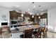 Open concept kitchen with ample counter space and dark cabinetry at 30224 N 52Nd Pl, Cave Creek, AZ 85331