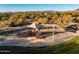 Community playground with shade structures and play equipment at 30224 N 52Nd Pl, Cave Creek, AZ 85331