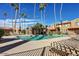 Inviting community pool with a relaxing patio at 3511 E Baseline Rd # 1210, Phoenix, AZ 85042