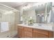 Bathroom with double vanity and walk-in shower at 3703 W Mccauley Ct, Phoenix, AZ 85086