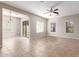 Dining area with tiled floors, sliding glass doors, and neutral walls at 3703 W Mccauley Ct, Phoenix, AZ 85086