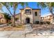 Two-story house with Spanish-style architecture, landscaping, and a walkway at 3703 W Mccauley Ct, Phoenix, AZ 85086