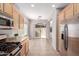 Kitchen with stainless steel appliances and sliding door to patio at 3703 W Mccauley Ct, Phoenix, AZ 85086