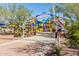 Adventure playground with a splash pad, railroad crossing, and colorful play structures at 3703 W Mccauley Ct, Phoenix, AZ 85086