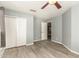 Bedroom with double door closet and vinyl flooring at 4028 W Palo Verde Dr, Phoenix, AZ 85019