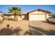 Ranch style home with a two-car garage and desert landscaping at 4028 W Palo Verde Dr, Phoenix, AZ 85019