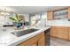 Kitchen island with stainless steel sink and dishwasher at 4028 W Palo Verde Dr, Phoenix, AZ 85019