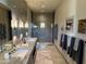 Spa-like bathroom with double sinks and a large shower at 41104 N 96Th St, Scottsdale, AZ 85262