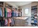 Well-organized closet with ample hanging and shelf space at 41104 N 96Th St, Scottsdale, AZ 85262