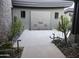 Landscaped courtyard with water feature and desert plants at 41104 N 96Th St, Scottsdale, AZ 85262