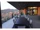 Covered patio with dining area, mountain views, and built-in heaters at 41104 N 96Th St, Scottsdale, AZ 85262