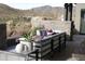 Relaxing patio features sectional sofa and stunning mountain views at 41104 N 96Th St, Scottsdale, AZ 85262