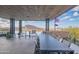 Outdoor patio with mountain views, dining table and seating at 41104 N 96Th St, Scottsdale, AZ 85262