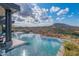 Infinity pool and spa with breathtaking mountain views at 41104 N 96Th St, Scottsdale, AZ 85262