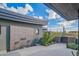 Modern water feature with stacked stone wall and desert landscaping at 41104 N 96Th St, Scottsdale, AZ 85262