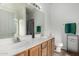 Bathroom with double sinks and a large mirror at 4212 S 78Th Ln, Phoenix, AZ 85043