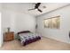 Cozy bedroom with tile floors and neutral decor at 4212 S 78Th Ln, Phoenix, AZ 85043