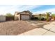 Single-story home with attached garage and desert landscaping at 4212 S 78Th Ln, Phoenix, AZ 85043