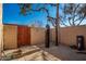 Backyard with a heavy bag and wooden gate at 4240 N 67Th Ln, Phoenix, AZ 85033