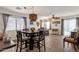 Casual dining area with a square table and four chairs at 43579 W Arizona Ave, Maricopa, AZ 85138