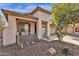 House exterior showcasing a front porch and drought-tolerant landscaping at 43579 W Arizona Ave, Maricopa, AZ 85138