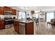 Well-equipped kitchen with stainless steel appliances and an island at 43579 W Arizona Ave, Maricopa, AZ 85138