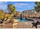 Enjoy the Arizona sunshine by the pool with a large patio area at 43579 W Arizona Ave, Maricopa, AZ 85138