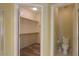 Guest bathroom with toilet and linen shelving at 45091 W Cypress Ln, Maricopa, AZ 85139